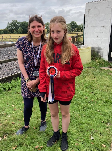 Most improved rider with her mum